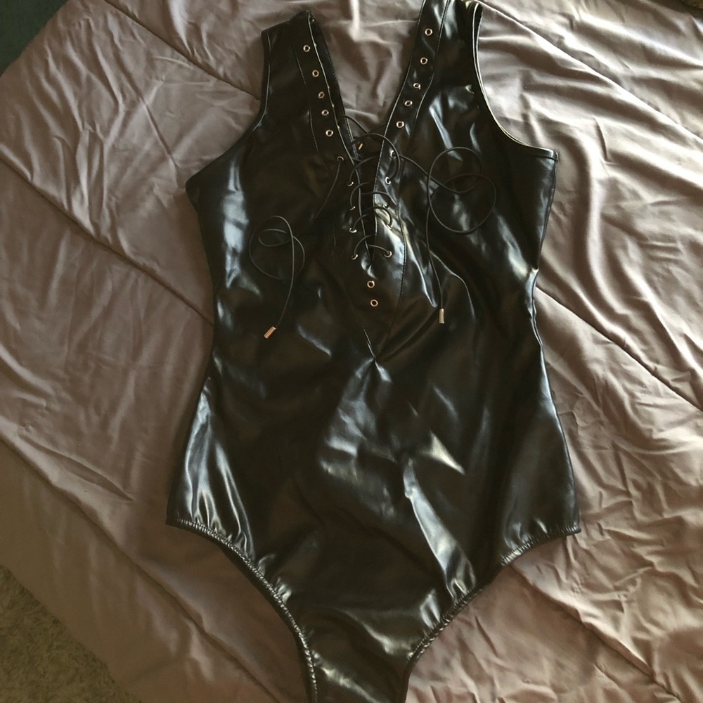 Leather dominatrix rave bodysuit